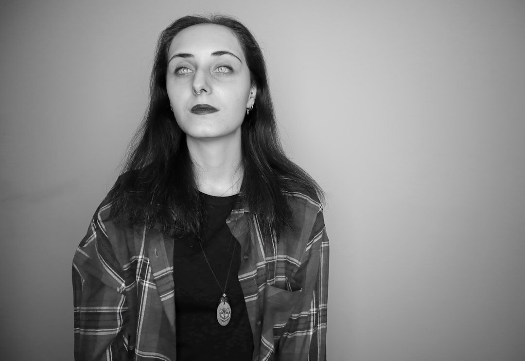 Studio portrait of a swiss woman journalist in her thirties with short brown hair